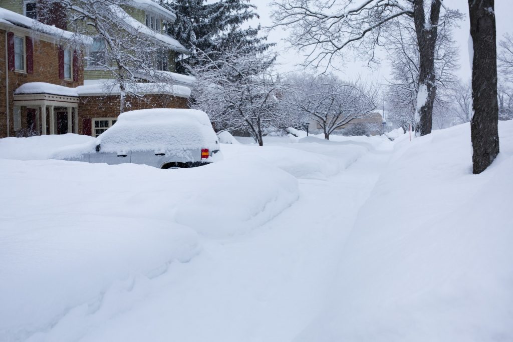 Winter Deep Snow Covered Car