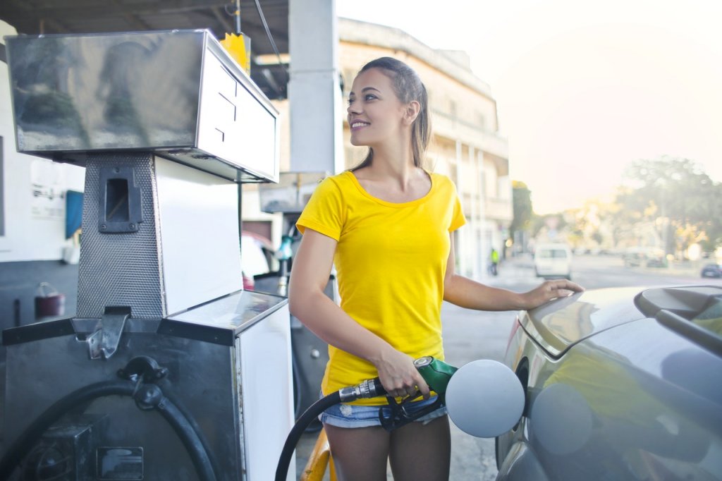 Woman Pumping BP Gas